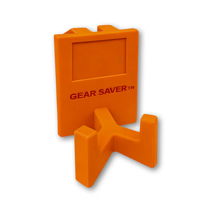 Gear Saver™ in orange. Patented fence mounted equipment hanger.