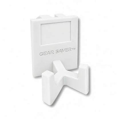 Gear Saver™ in white. Patented fence mounted equipment hanger.